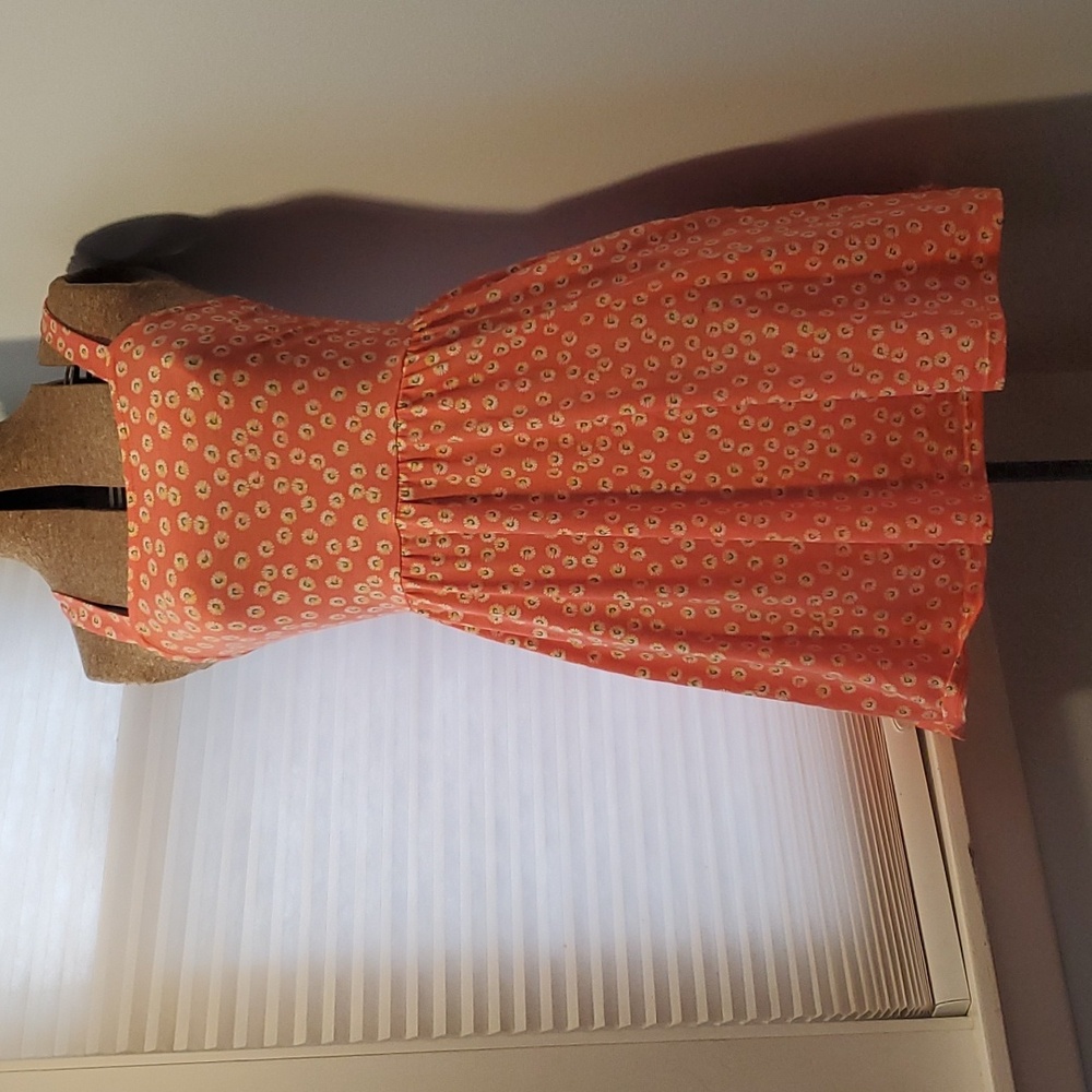 3/$25 Rayon blend floral mini sundress with pockets sz small